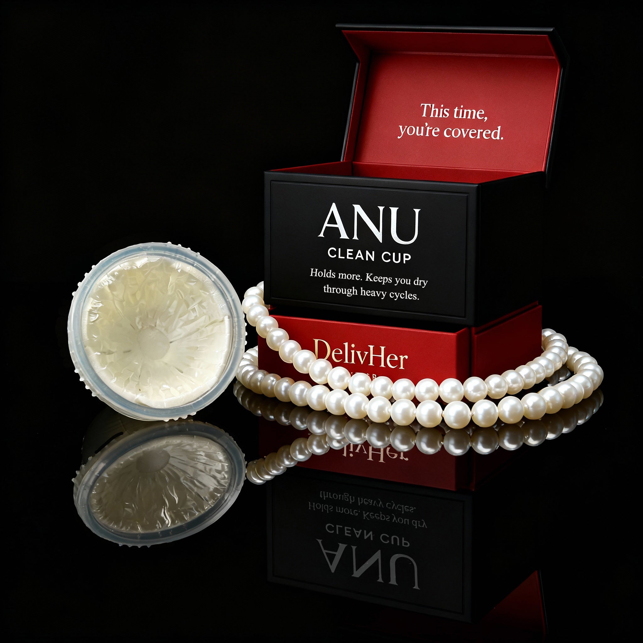 ANU Clean Cup packaging withDelivHer branding on a black background